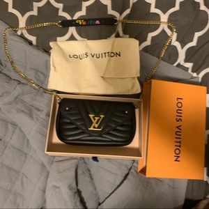 Louis Vuitton clutch/ crossbody